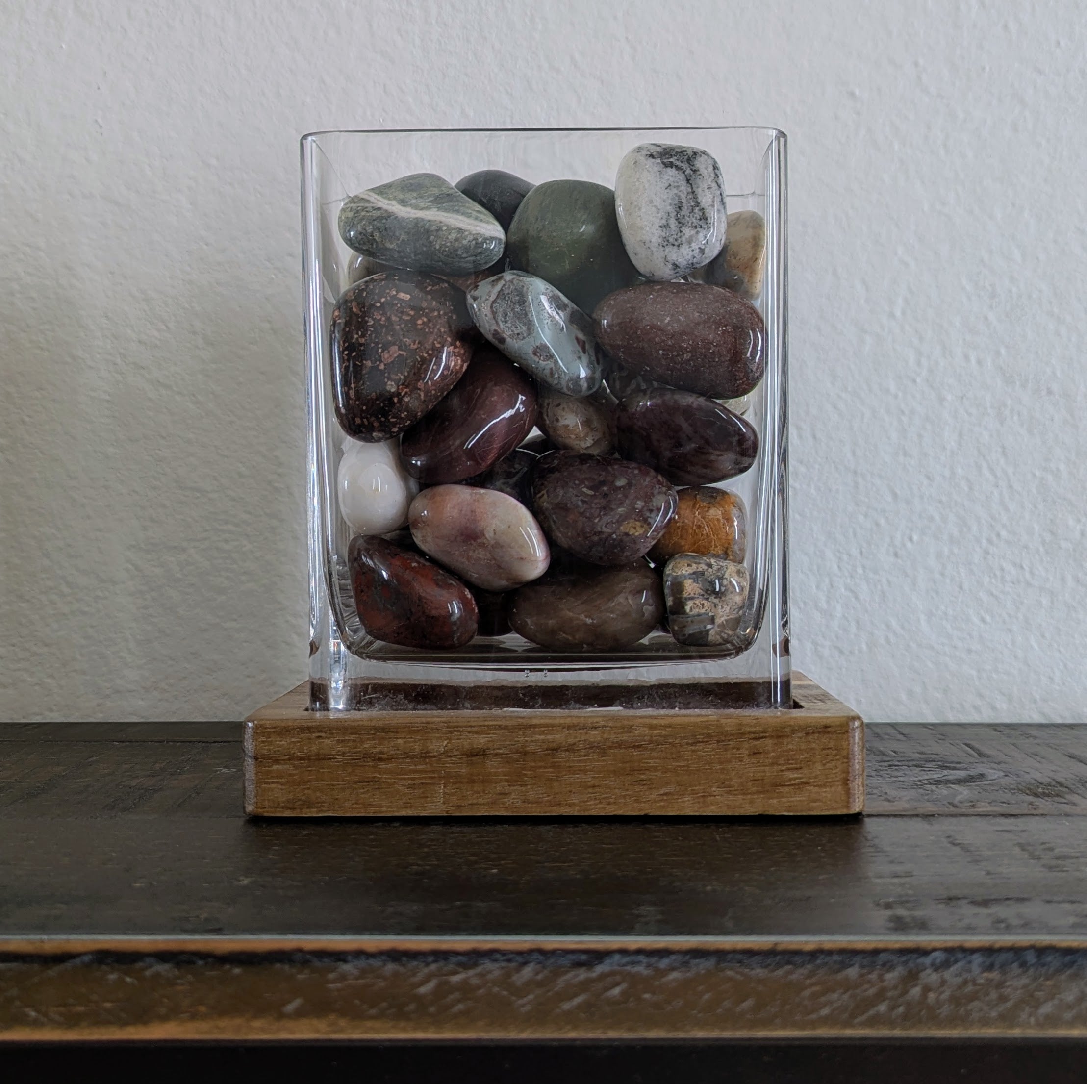 Signature Vertical Glass Display with Tumbled Stones