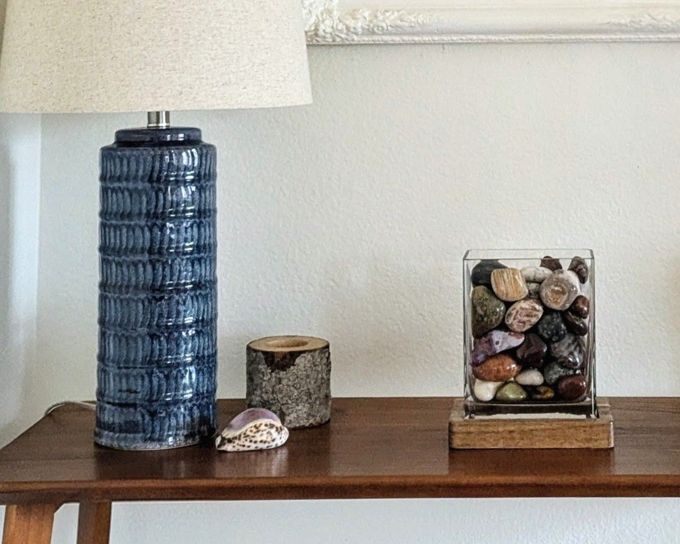 Signature Vertical Glass Display with Tumbled Stones